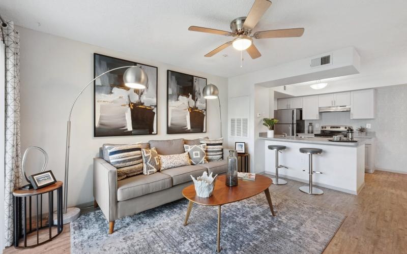 a living room with a couch and a table