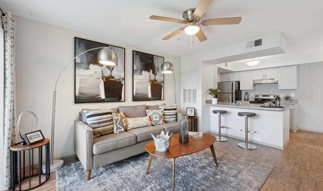 a living room with a couch and a table