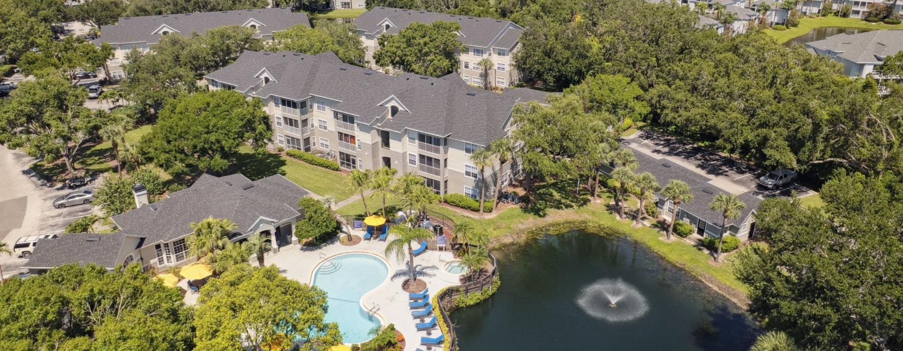 a large house surrounded by trees